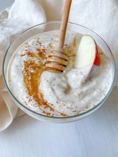 an apple and cinnamon dip in a glass bowl