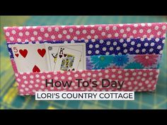 a pink and white box with playing cards in it that says how to's day lori's country cottage