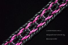 pink and black braiding on a black background