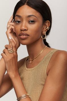 Add a bold touch to your style with the Jules Textured Hoops. These 14K gold hoop earrings are designed with a unique textured finish, giving them a modern edge that stands out. At 25.3mm in size, they’re the perfect mix of statement-making and everyday wear, offering just the right balance of elegance and versatility. Whether you’re dressing up or going casual, these hoop earrings will be your go-to accessory for a chic, polished look. Be prepared for compliments! Modern 14k Gold Hoop Earrings For Evening, Modern Gold-plated Hoop Earrings For Evening, Modern Gold Plated Hoop Earrings For Evening, Chic Yellow Gold Huggie Earrings, Modern Gold Hoop Earrings For Evening, Elegant Hammered Rose Gold Hoop Earrings, Chic Gold Hammered Hoop Earrings, Elegant Hammered Gold Huggie Earrings, Chic Drop Earrings For Everyday Luxury