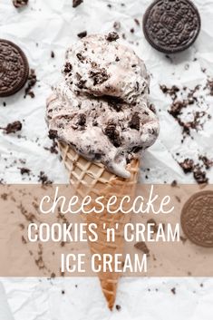 an ice cream cone with oreo cookies on it and the words cheesecake cookies n'cream ice cream