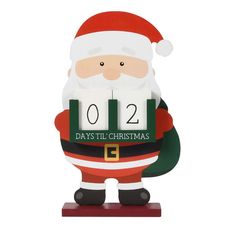 a christmas ornament with a santa clause holding two blocks that say days till christmas