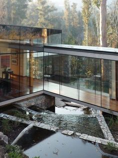 the inside of a house with glass walls