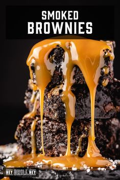 a stack of brownies with caramel drizzled on top and the words, smoked brownies