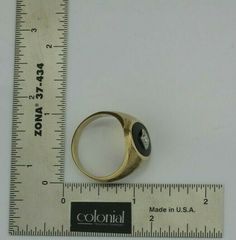 "Vintage 14K Yellow Gold Black Onyx and Diamond Center Ring, oval black onyx, flat cabochon with .15ct diamond center set in white gold, offset square mount, florentine finish to ring, .75\" across ring, Ring size 13, Circa 1950, 12.5 grams Stock # BB232R21 Most rings are sizable for a small fee. If the ring you are considering is the incorrect size contact us for a quote. This listing contains photographs of the actual item you will receive. Our items are in excellent condition with little or n Ring Oval, Fine Jewelry Designers, Boston Ma, Blue Topaz Ring, Topaz Ring, Ring Ring, Pink Tourmaline, Black Onyx, Gold Black