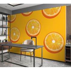 an orange wallpaper mural in a modern office setting with a desk and chairs,