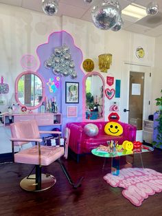 a living room filled with furniture and mirrors