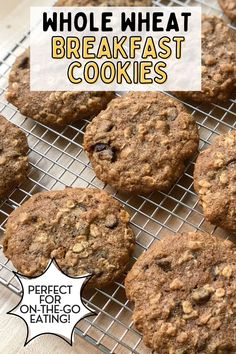 several cookies cooling on a wire rack with the words, whole wheat breakfast cookies