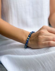 Lapis lazuli is a powerful stone for spiritual growth and enlightenment. This bracelet is designed to help you connect with the wisdom and power of lapis lazuli, and to promote your ongoing spiritual growth. The beautiful blue color of the stone is said to be associated with the divine, and wearing it can help you access your inner guidance and intuition.