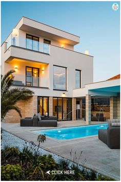 a house with a swimming pool in front of it