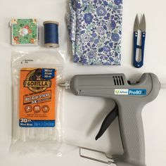 the supplies needed to make this diy project include glue, scissors, and fabric