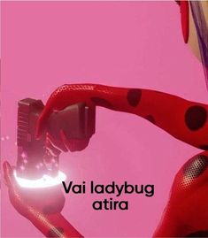 there is a woman holding a camera with the words vai ladybug atria on it