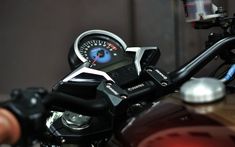 a close up of the speedometer on a motorcycle