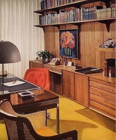 a room with a desk, chair and bookshelf