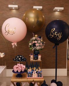 a table topped with balloons and desserts