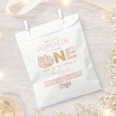 a white paper bag with the words pumpkin is turning one and it's birthday