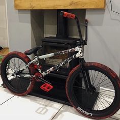 a bike is parked in front of an oven