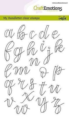 the alphabet is drawn in black ink on white paper with green border and writing underneath it