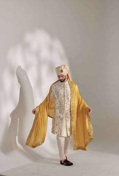 Featuring hand embroidered placement sherwani with ivory moti work, with dabka highlighting. Paired with embroidered mustard stole and ombre champagne safa, matching kurta and churidar. Manpreet Toor, Moti Work, Dhoti Pants, Royal Look, Haldi Ceremony, Indian Man, Indian Wedding Outfits, Punjabi Suits, Churidar