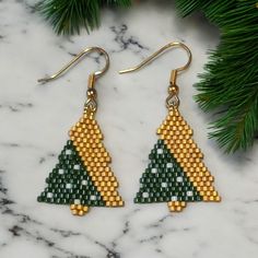 two green and yellow beaded christmas tree earrings