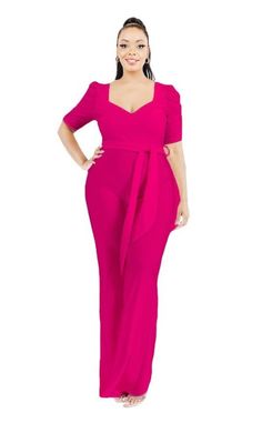 This elegant Curvy Style Fuschia Jumpsuit features a sweetheart neckline and keyhole back for a flirty touch. The attached belt accentuates your curves, making it a flattering and stylish choice. Perfect for any occasion, this jumpsuit is a must-have for your wardrobe. All Sales are Final Model Wearing 1x Elegant Fitted V-neck Jumpsuits And Rompers, Elegant Jumpsuits And Rompers With Sweetheart Neckline For Party, Elegant Jumpsuits With Sweetheart Neckline For Night Out, Fitted Jumpsuit With Sweetheart Neckline For Date Night, Chic Fitted Jumpsuit With Sweetheart Neckline, Chic Fitted Jumpsuits With Sweetheart Neckline, Chic Fitted Jumpsuits And Rompers With Sweetheart Neckline, Elegant Stretch Jumpsuits And Rompers In Solid Color, Elegant Pink Stretch Jumpsuits And Rompers