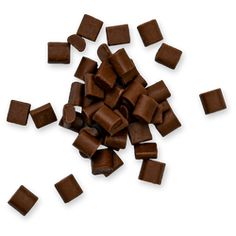 chopped chocolate pieces on a white background