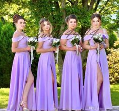 the bridesmaids are wearing purple dresses with thigh high slits