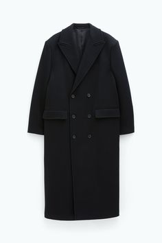 Classic Black Oversized Wool Coat, Classic Black Structured Outerwear, Oversized Black Outerwear With Double Button Closure, Black Oversized Structured Outerwear, Oversized Black Outerwear With Concealed Placket, Black Wool Coat With Concealed Placket For Winter, Black Double-breasted Wool Coat With Concealed Placket, Black Double-breasted Structured Outerwear, Black Structured Double-breasted Outerwear