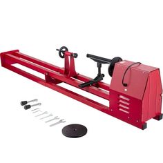 a red bench with tools on top of it