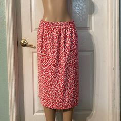 Size Small Color Red In Good Condition Brand New Red Skirt With Elastic Waistband For Spring, Red Midi Skirt With Elastic Waistband, Red Spring Skirt With Pockets, Red Skirt With Pockets For Spring, Red Knee-length Skirt For Spring, Casual Red Pencil Skirt, Red Fitted Skirt With Elastic Waistband, White Floral Skirt, Floral Skirt