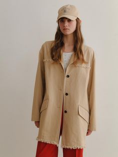 This product, referred to as the Blair Half Coat, features a casual, oversized design with frayed detailing along the edges for a contemporary touch. The coat's single-breasted front and simple collar contribute to its relaxed yet sophisticated aesthetic. It is a versatile piece that can easily transition from day to night and from casual to smart-casual settings. - The oversized fit provides a comfortable and laid-back look, suitable for various body types.- Frayed detailing along the coat's edges adds a modern, deconstructed style element.- A single-breasted front and simple collar give it a clean and versatile appearance.- The coat's design is perfect for layering over diverse outfits, making it an essential wardrobe item for effortless styling. Everyday Relaxed Fit Outerwear With Frayed Hem, Chic Cotton Outerwear With Frayed Hem, Casual Single Breasted Outerwear For Daywear, Spring Daywear Outerwear With Concealed Placket, Casual Single-breasted Outerwear For Daywear, Spring Outerwear With Concealed Placket For Daywear, Everyday Long Sleeve Outerwear With Frayed Hem, Spring Outerwear With Concealed Placket And Relaxed Fit, Spring Oversized Outerwear With Concealed Placket