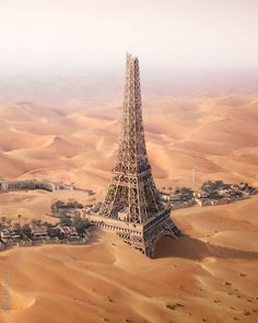 an aerial view of the eiffel tower in the middle of the desert,