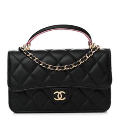 This is an authentic CHANEL Lambskin Quilted Flap Phone Holder With Chain in Black and Lilac. This chic mini crossbody classic is crafted of quiltedlambskin leather in black. The bag features a leather top handle, a gold chain link leather-threaded shoulder strap and a facing gold CC logo. The front flap opens to a pink leather interior with zipper and patch pockets. Black Bags With Diamond Quilting For Evening, Black Evening Bags With Diamond Quilting, Luxury Black Flap Bag With Chain Strap, Black Diamond Quilted Evening Bag, Luxury Quilted Flap Bag With Top Handle, Chanel Flap Phone Holder With Chain, Chanel Lambskin Bag, Chanel Lamb Skin Top Handle Bag, Black Diamond-quilted Evening Bag