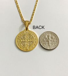 "18K GOLD FILLED SAINT BENEDICT NECKLACE 20\" LONG... FOR GOOD LUCK ,PROSPERITY AND PROTECTION. PENDANT : 30 mm x 20 mm 18K GOLD FILLED CADENA DE SAN BENITO 20\" LARGO ..PARA PROSPERIDAD, BUENA SUERTE Y PROTECCION. DIJE: 30 mm x 20 mm" Gold Medallion Necklace For Good Luck, Gold Round Charm Necklaces For Good Luck, Gold Blessing Jewelry, Gold Round Jewelry For Blessing, Gold Good Luck Charm Necklace Nickel Free, Gold Nickel-free Charm Necklaces For Good Luck, Gold Nickel-free Charm Necklace For Good Luck, Personalized Gold Necklace For Blessing, Protection Pendant