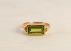 Rectangular Peridot Stack Ring in 14K Yellow Gold 14k Gold Green Rectangular Ring, Rectangular Green 14k Gold Ring, Green Rectangular 14k Gold Ring, Rectangular Yellow Gold Rings With Birthstone, Green Rectangular Bezel Set Ring, Green Rectangular Rings With Bezel Setting, Rectangular 14k Gold Rings With Bezel Setting, 14k Gold Rectangular Rings With Bezel Setting, Heirloom Green Rectangular Rings