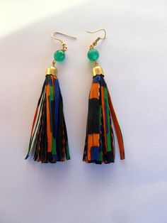 Kente fringe Earrings - African Print Textile Green Tassel Long Dangling Earrings Bohemian Orange Tassel Earrings, Traditional Green Tassel Earrings, Orange Fringe Dangle Earrings, Multicolor Tassel Latkans Drop Earrings, Multicolor Latkans Tassel Drop Earrings, Multicolor Tassel Drop Earrings With Latkans, Green Tassel Drop Earrings With Latkans, Adjustable Orange Tassel Earrings, Orange Tassel Dangle Earrings