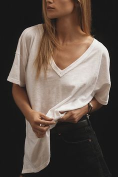 A certified staple, the top-rated Jordyn Tee features an easygoing, oversize fit and soft, cotton-slub jersey. | The Jordyn Perfect Oversized Cotton-Slub T-Shirt by Pilcro: V-Neck Edition in White, Women's, Size: XS at Anthropologie Fitted Jeans, Womens Basic Tops, Plain White T Shirt, White T Shirts, Ladies Tee Shirts, Basic Long Sleeve, Cotton Pullover, Boho Blouses, Basic Tops