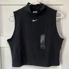 Black. New With Tags. Machine Washable. Black Athleisure Tops, Black Go-dry Sportswear Top, Casual Black Tops With Go-dry, Black Sportswear Top For Workout, Black Sporty Tops For Workout, Sporty Black Tops For Workout, Sporty Black Tops With Medium Support, Black Sleeveless Top With Medium Support, Black Sporty Top For Gym