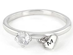 Pre-Owned 0.35ct Round White Zircon Rhodium Over Sterling Silver Heart Charm Initial "M" Ring. Measures Approximately 0.19"L x 0.19"W. Not Sizeable. .  This product may be a customer return, vendor sample, or on-air display and is not in its originally manufactured condition.  It may not be new.  In some instances, these items are repackaged by JTV. Vs Clarity Round Cut Initial Ring For Anniversary, Anniversary Initial Ring With Vs Clarity Round Cut, Silver Heart Cut Single Diamond Ring, Silver Heart Cut Ring With Single Diamond, White Gold Initial Ring With Brilliant Cut For Promise, Anniversary Initial Ring With Brilliant Round Cut, White Gold Heart Ring With Single Diamond, Round Initial Ring With Prong Setting For Anniversary, Anniversary Initial Ring With Prong Setting