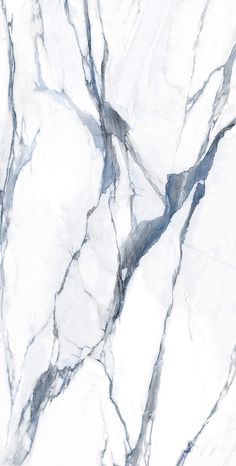 the marble is white and grey with black streaks on it's surface, as well as blue lines