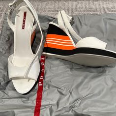 Prada White Ankle Strap Platforms / Wedge Sandals (Size 40) Never Worn White/Orange Size 40 No Box Includes Dust Bag Prada Shoes Women Wedge Heels, Black Platform Wedges, Prada Sneakers, Knee High Platform Boots, Chunky Platform Sandals, Shoes Prada, Casual Dress Shoes, Platform Espadrilles, Leather Platform Sandals