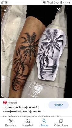 two palm trees tattoo on someone's leg, one is black and the other is white