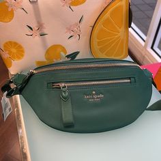 Kate Spade Chelsea Nylon Belt Bag Fanny Pack Color: Deep Jade New With The Tag Authentic 5.1"H X 12.2"W X 3.2"D Nylon Trim: Smooth Pvc Metal Pinmount Logo Two Way Spade Jacquard Lining Back Credit Card Pockets Imported Dust Bag Not Included Style # Wkr00561 Fanny Pack Waist Bag Green Belt Bag With Zipper Closure, Green Belt Bag For Travel, Green Nylon Belt Bag With Removable Pouch, Green Nylon Travel Belt Bag, Green Nylon Belt Bag For Travel, Green Kate Spade Shoulder Bag For Travel, Kate Spade Green Travel Bag, Green Kate Spade Travel Bag, Casual Nylon Kate Spade Bag