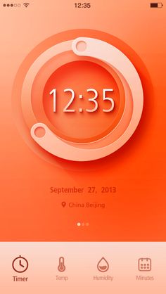 an orange and white clock with the time on it's screen, next to other icons