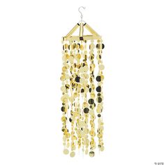 a gold and black mobile hanging from a wooden hanger