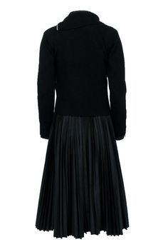 Embrace the dark side with this unique Sacai pleated dress, featuring a versatile detachable hoodie, and a long-sleeve pleated dress for a touch of gothic flair. Pair with chunky combat boots and statement accessories for an edgy head-turning ensemble. Size 2 Dress Shell 65% Polyester 35% Cotton Hoodie Shell 100% Wool Unlined Detachable hoodie Long sleeves Pleated throughout Bust 33” Waist 38” Sleeve length 24.5” Shoulder to hem 47” Shoulder to shoulder 15.5” Pleated Evening Dress For Fall, Fall Long Sleeve Dress With Accordion Pleats, Fall Dresses With Accordion Pleats And Long Sleeves, Black Long Sleeve Dress With Pleated Skirt, Chic Fall Dresses With Accordion Pleats, Fall Evening Pleated Fitted Dress, Fitted Dress With Accordion Pleats For Fall, Fall Evening Pleated Dress, Evening Pleated Dress For Fall