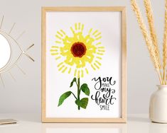 a yellow sunflower with the words you are my sunshine smile in front of it