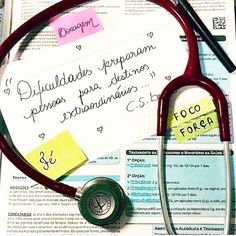 a medical stethoscope sitting on top of a piece of paper with notes attached to it