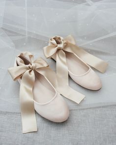 Elegant Beige Lace-up Flats, Elegant Wedding Ballet Flats With Satin Bow, Wedding Ballet Flats With Bow And Closed Toe, Elegant Lace-up Ballet Flats For Party, Wedding Flats With Bow Detail, Elegant Lace-up Ballet Flats, Spring Wedding Ballet Flats With Bow, Elegant Flats With Satin Bow And Round Toe, Spring Wedding Ballet Flats With Ankle Strap