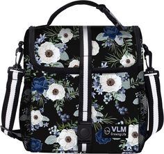 a black floral bag with white and blue flowers on it